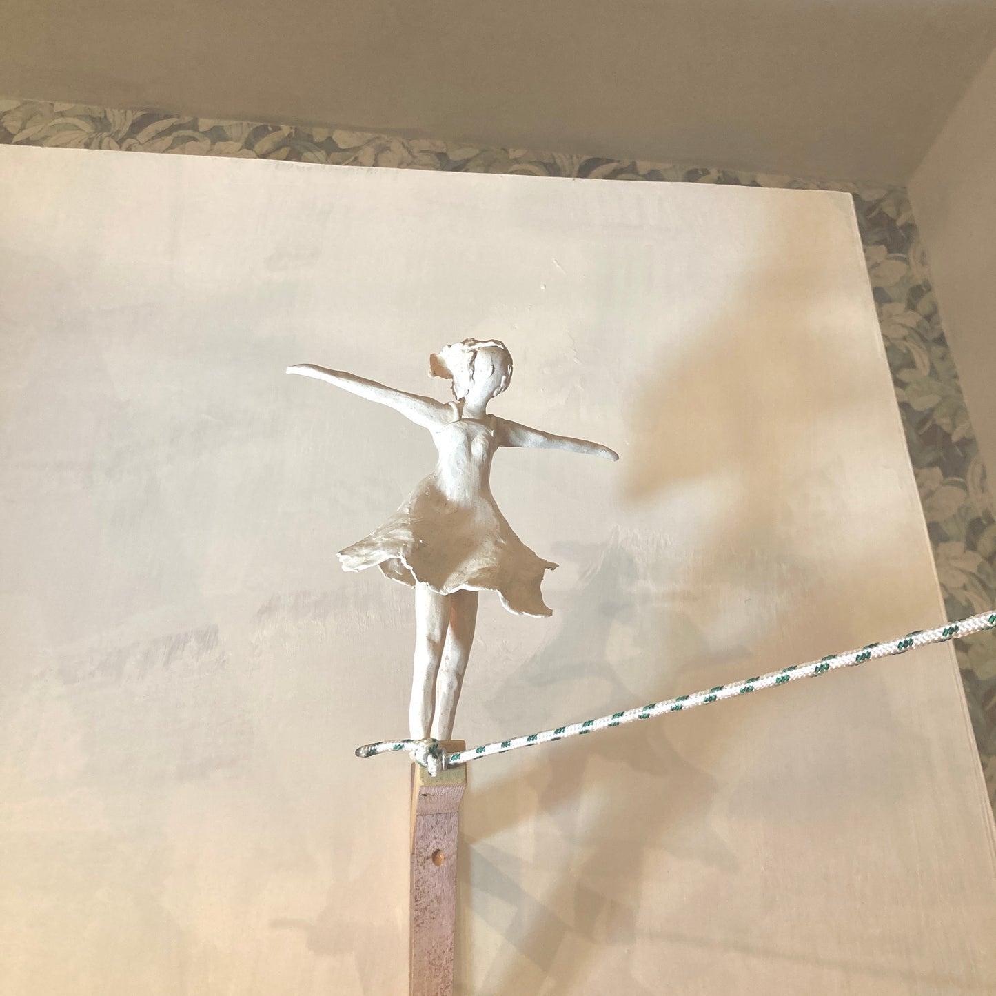 HIGH-WIRE ARTIST SCULPTURE